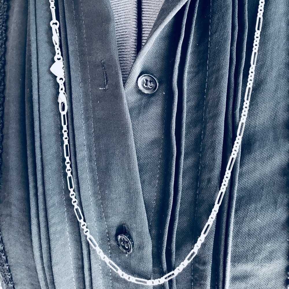 Silver necklace.
